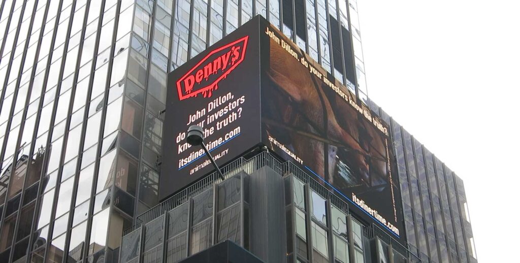 Times Square Billboard Exposes Denny’s Cruelty Toward Mother Pigs