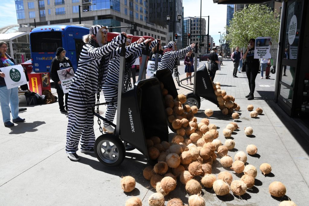 Chained PETA ‘Monkeys’ to Dump Coconuts at First Street Whole Foods Over Ties to Forced Labor