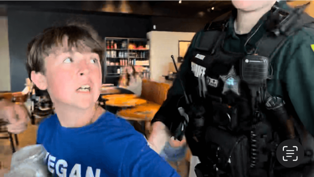 Video: 13-Year-Old Boy Roughed Up by Police, Wrongfully Arrested at PETA Protest of Starbucks