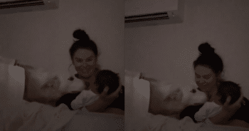 3AM Serenity: New Mom and Dog Watch Over Newborn in Sweet Moment