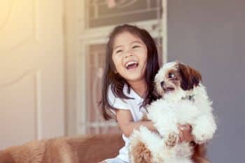 9 Gentle Dog Breeds That Kids Instantly Trust